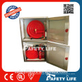 Fire fighting cabinet with swing type hose reel